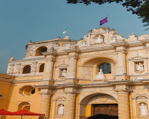 Historical architecture in Antigua Guatemala with a local cafe